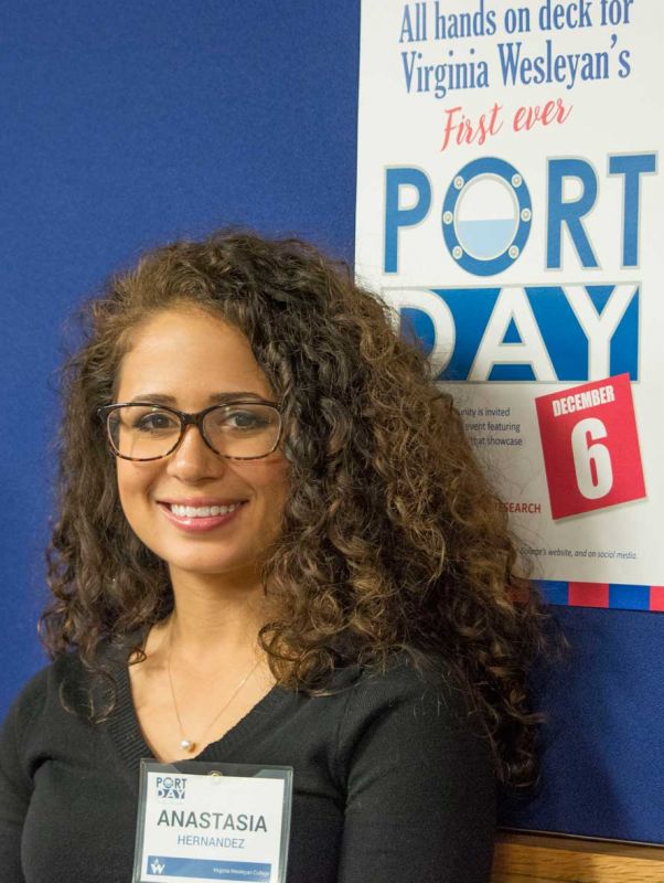 Student Anastasia Hernandez with Port Day Poster