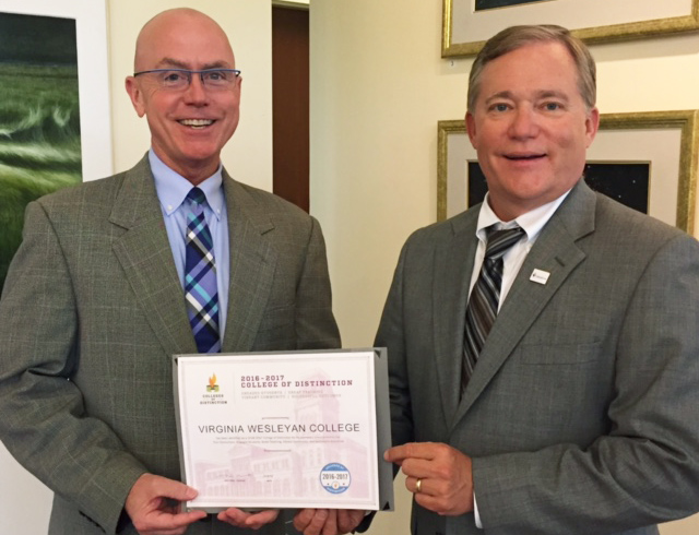 President Scott Miller (right) presents the 2016-2017 College of Distinction certificate to Vice President for Enrollment David Waggoner. 