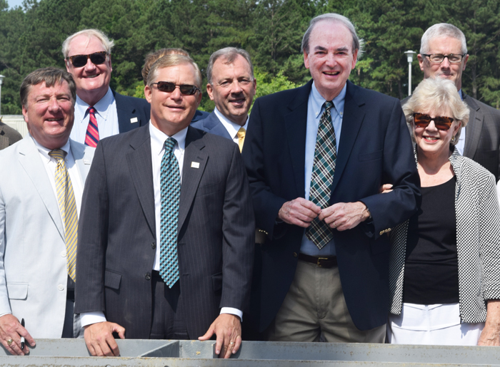 Pictured (from left): Chair of the Virginia Wesleyan College Board of Trustees Gary D. Bonnewell '79, VWC Vice President for Advancement Mort Gamble, Virginia Wesleyan College President Scott D. Miller, President of Hourigan Construction Mark Hourigan, Billy and Fann Greer, and Chris Brandt, Executive VP of Hourigan Construction.