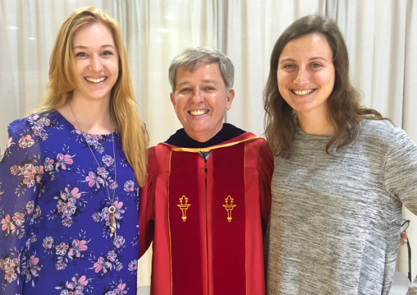 MARLINS OF MERIT: Seniors Gabrielle Freese (left) and Taylor Simon, pictured with Dr. Terry Lindvall, received the Monarch Bank William "Tree" Rountree Young Life Scholarship.
