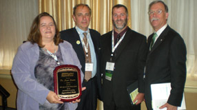 VWC Professor of Chemistry Dr. Joyce Easter accepts award for green chemistry initiatives. Pictured with her are Rolf Schlake (Applied Separations), Doug Raynie (South Dakota State University), Bob Peoples (ACS GCI)