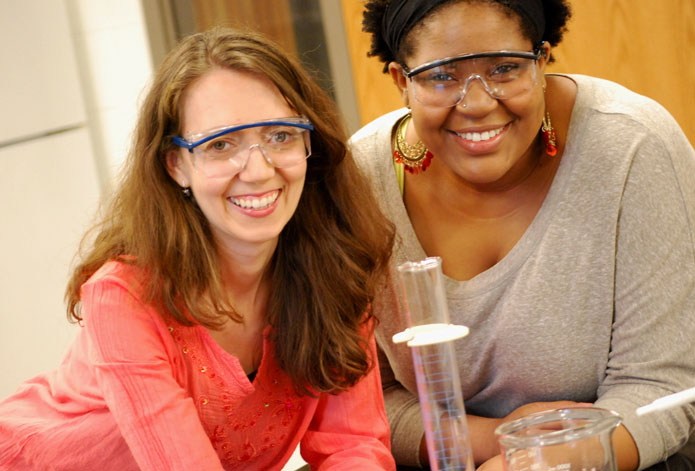 ATMOSPHERE OF LEARNING: Dr. Elizabeth Malcolm (left) in the newly renovated  Blocker Environmental Science Lab with  student Erica Sears '13