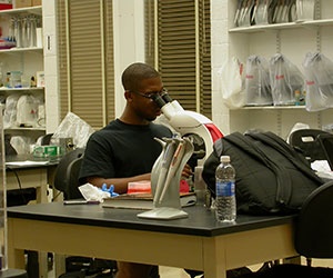 LeMar Callaway working in a Blocker Hall lab, summer 2015. Photograph by Prof. Phil Rock.