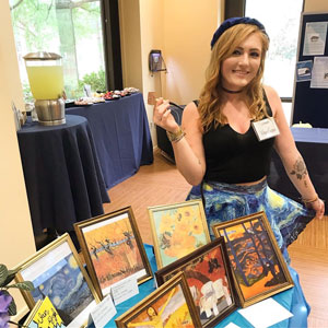 Creecy playing the role of Vincent Van Gogh in an art show simulation at Virginia Wesleyan University, April 29, 2919. Anonymous photographer.