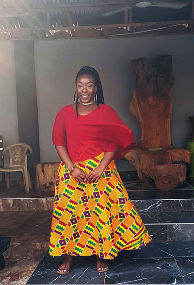 Richards standing in front of Ohene’s (Chief’s) throne at the Akwasidae Festival in in Adumasa, Ghana, February 2020. (Photograph by Avyance Ervin)