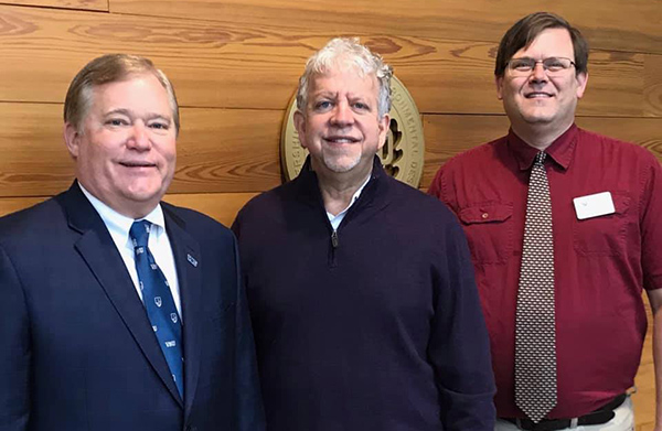 VWU President Scott D. Miller, VFIC President Matthew Shank, and VWU Associate Provost Maynard Schaus.