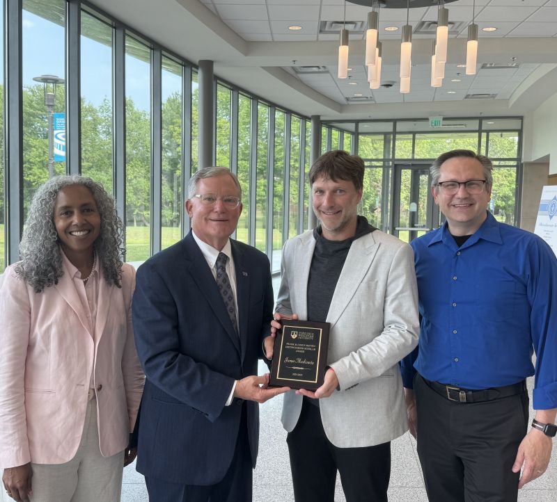 James Moskowitz pictured with Deirdre Gonsalves-Jackson (Provost and Vice President), President Scott D. MIller, and Travis Malone (Anne B. Shumadine Dean of the Batten Honors College)
